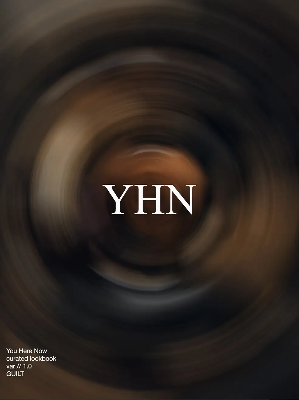 SS26 lookbook, Guilt: a swirl of blurred brown light around a dark centre, with YHN lettering