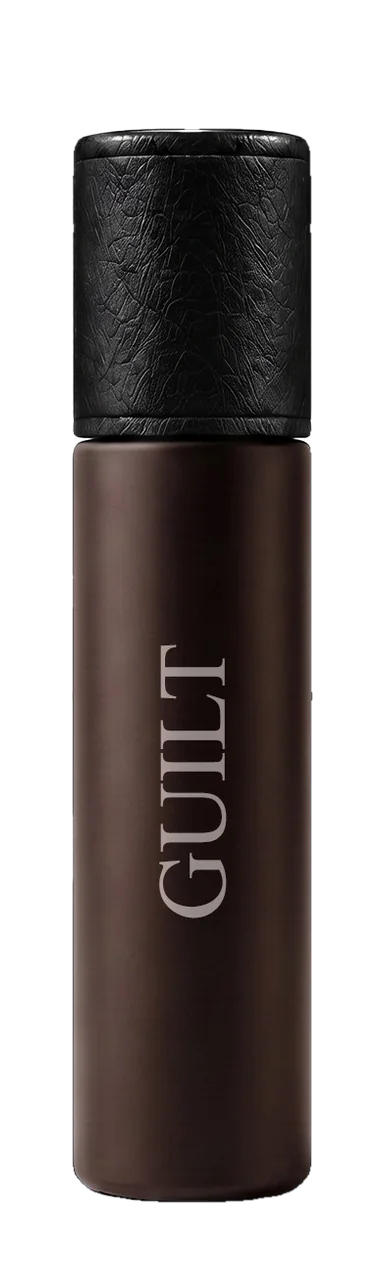 Guilt Eau de Parfum, 10 ml bottle, side, showing the fragrance name